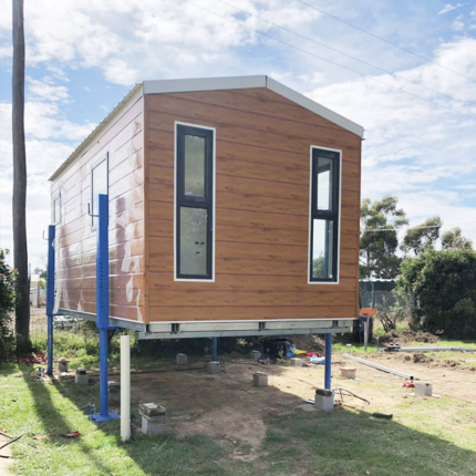 Au/Nzs/USA Standard Light Steel Prefabricated Folding House with Solar Panel