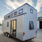 Prefabricated Tiny House Looks Like a Cabin on Wheels with 2 Bedroom Holiday House