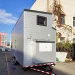Prefabricated Tiny House Looks Like a Cabin on Wheels with 2 Bedroom Holiday House