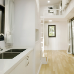 Prefabricated Tiny House Looks Like a Cabin on Wheels with 2 Bedroom Holiday House